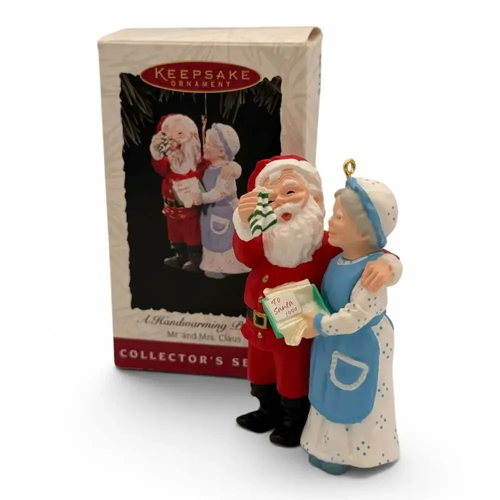 Hallmark Keepsake A Handwarming Present Mr and Mrs Claus Ornament 1994